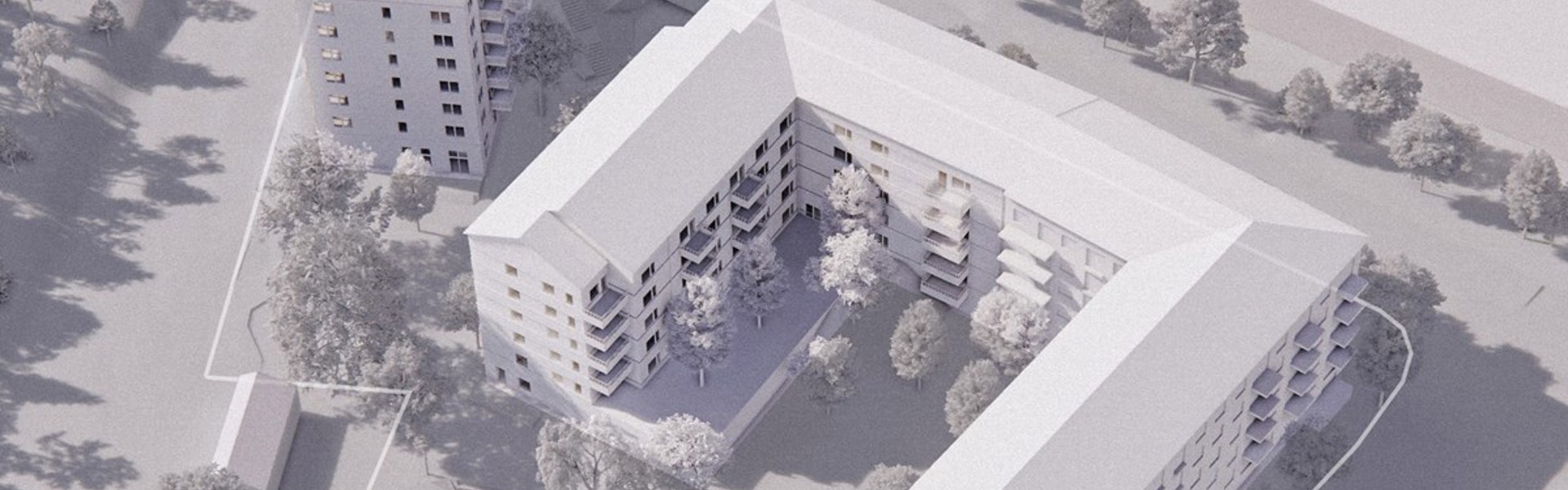 flygbild över tänkta bostäder. Vita byggnader på grå karta.