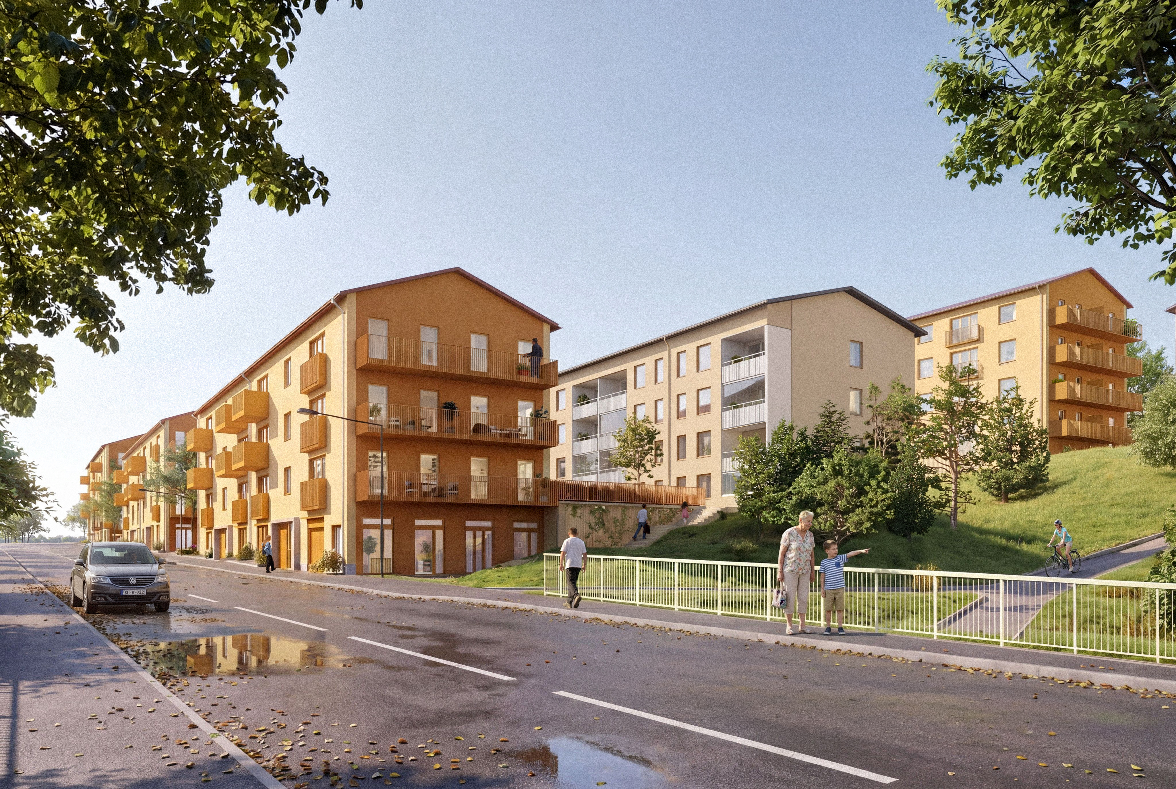 Visionsbild över två nya hyreslägenhetshus på var sin sida av befintligt hus. Två ljusgula byggnader och en ljusbeige i en sluttning mot väg.  