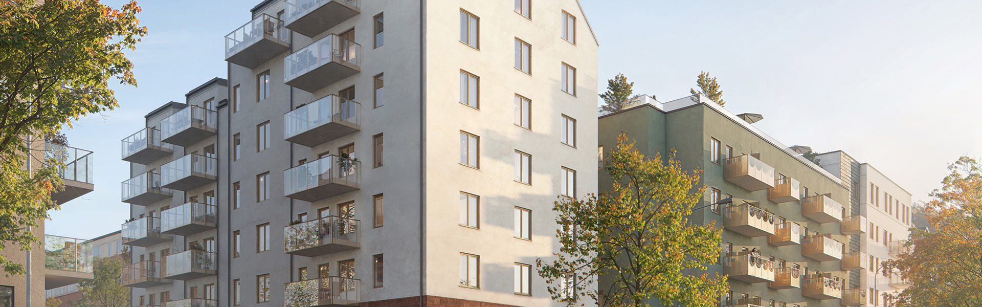 exteriör visionsbild på ljus fasad med rött tegel i bottenvåning, sedd från gatan