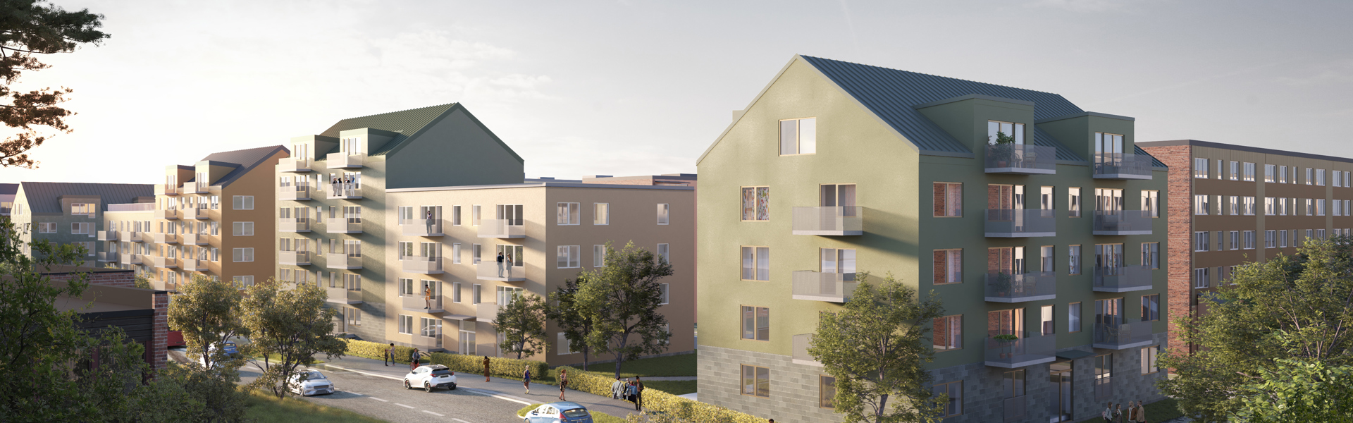 Visuell vy över kvarter med flerfamiljshus. Bro över väg i förgrund och hus medgröna och beigea fasader i bakgrund.