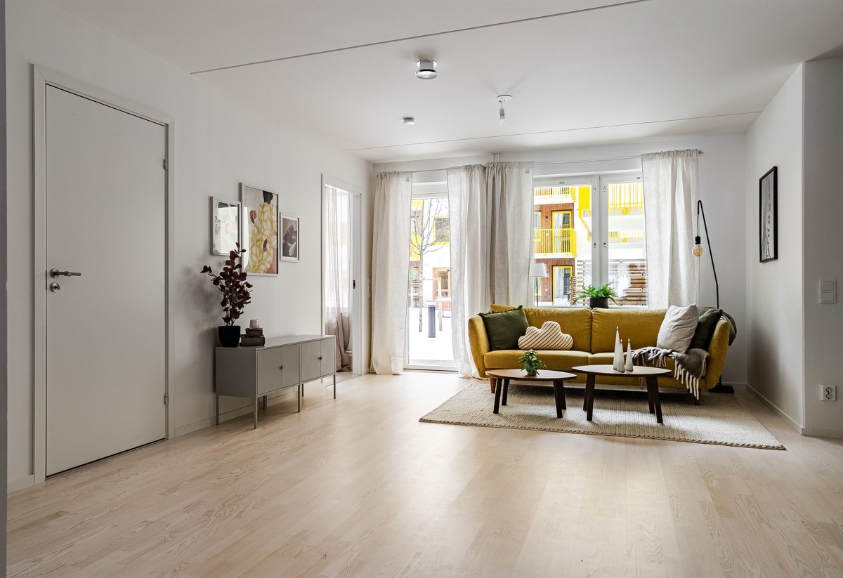 Visningslägenhet i Atlantis med fokus på vardagsrummet